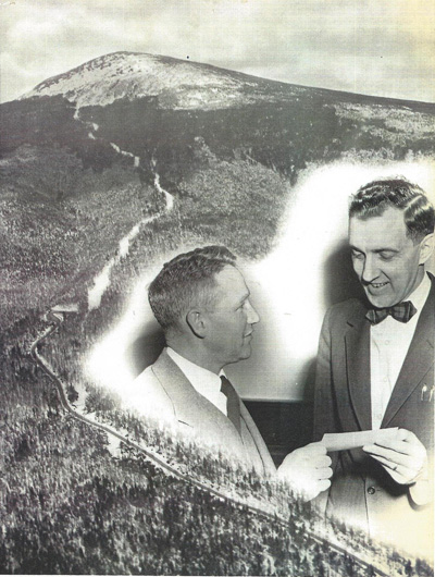 George Mendall sells his first share of Sugarloaf stock to then Governor Edmund Muskie.