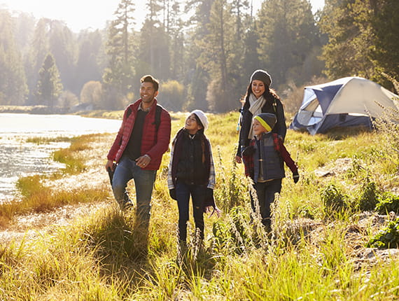 Multiracial family camping