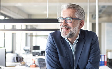 Smiling businessman in office