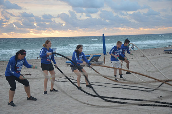 Participants performing ropes action