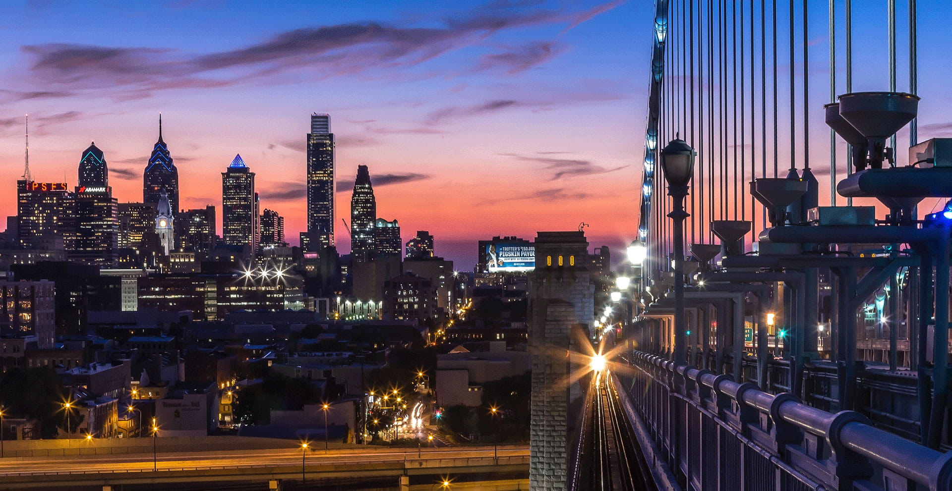 Philadelphia Skyline view from Ben Franklin Bridge at Sunset