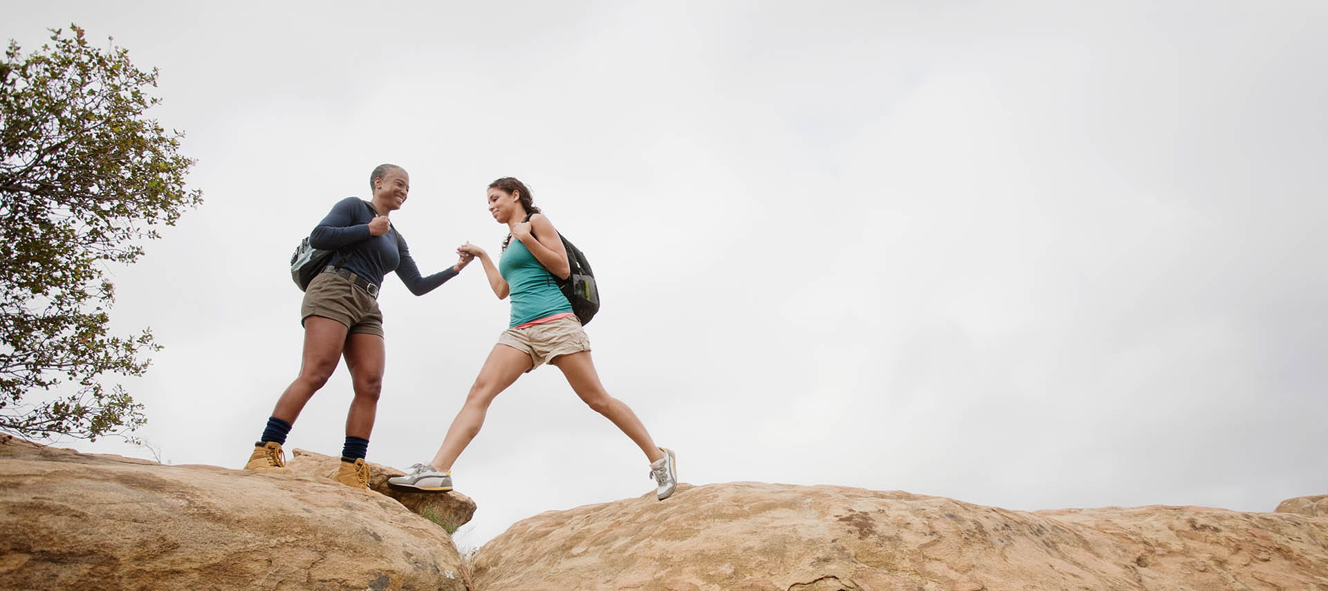 Mother and daughter hiking together.