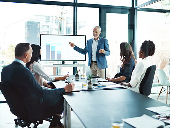 Caucasian male delivering a presentation