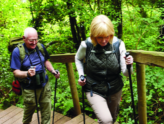 Mature Caucasian couple on a hiking trail