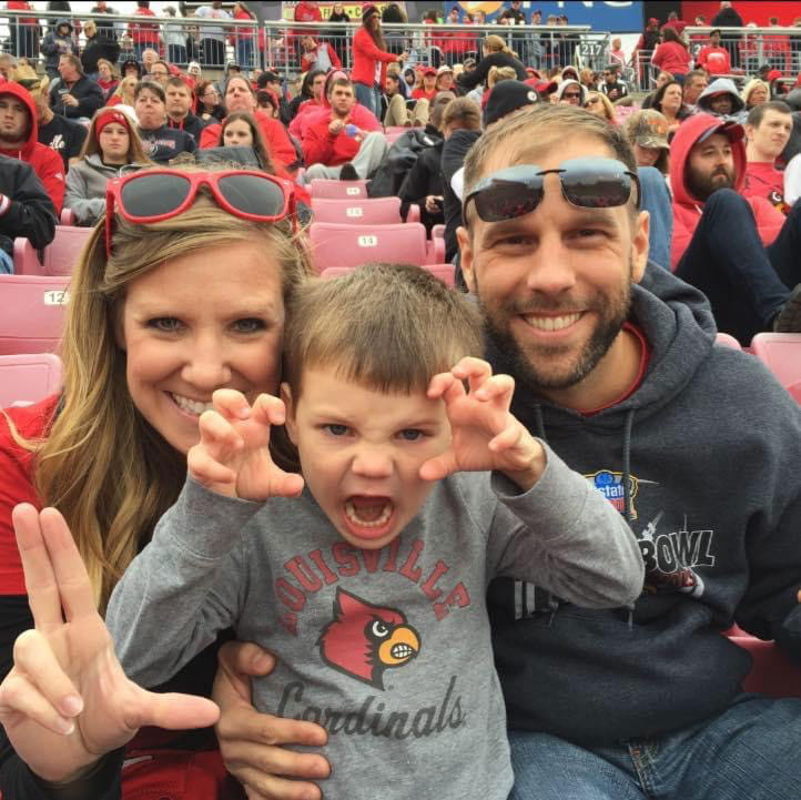 Kristina and family at a local cardinals sporting event