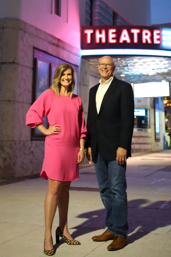 Rhonda and Gregory outside a theatre