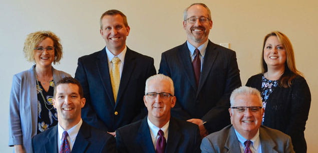 Goodwater Wealth Management Group team photo. (top row from left to right: Jaynie Guerrero, Greg Bowden, Doug Noble and Angie Spinner. Bottom row from left to right: Jason Smith, Rod Dahl and Joe French.)