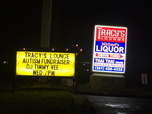 Tracy's Lounge sign with Autism Fundraiser marquee