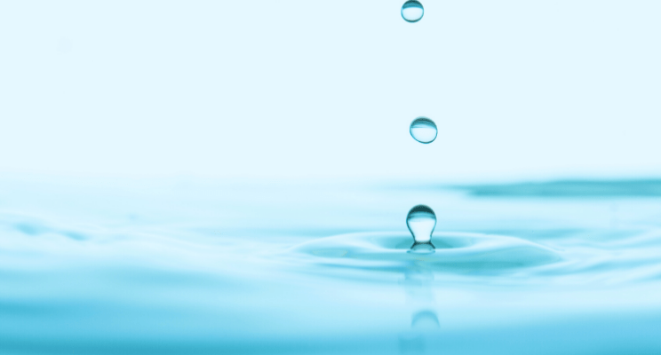 Droplets bouncing off water