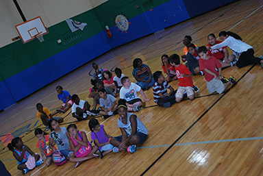 The kids gather in the gymnasium for the award assembly.