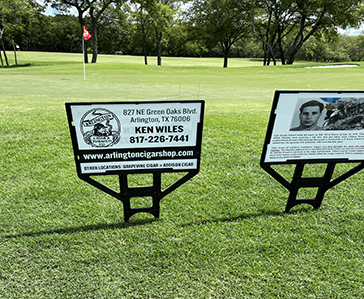 Ken Wiles sign on golf course.