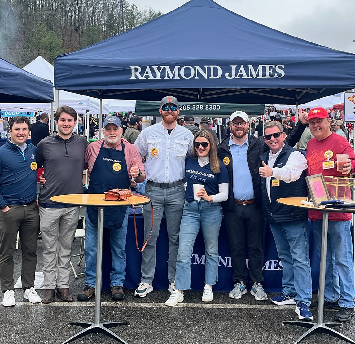Associate outdoor group photo at the complex wide Chili Cookoff event.