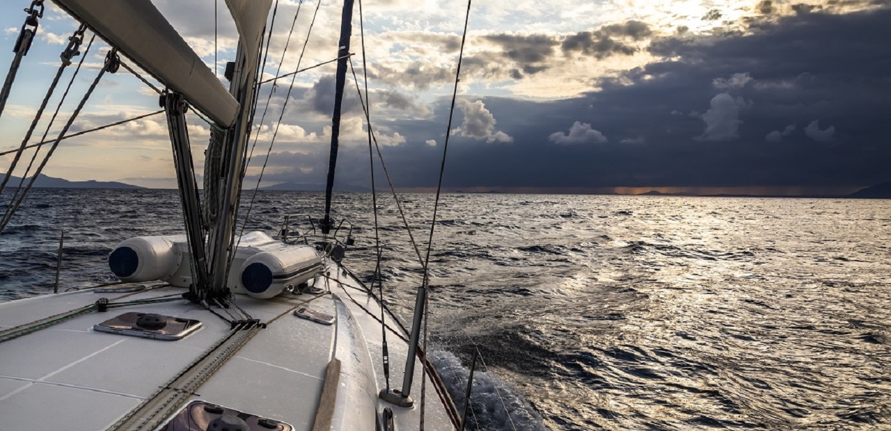 View of sailboat on open water