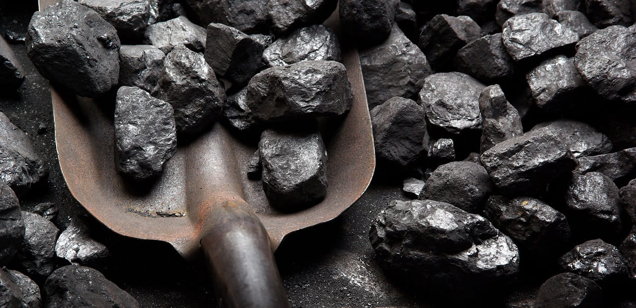 Close up of shovel with coal