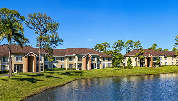 Apartment buildings surrounding a small lake